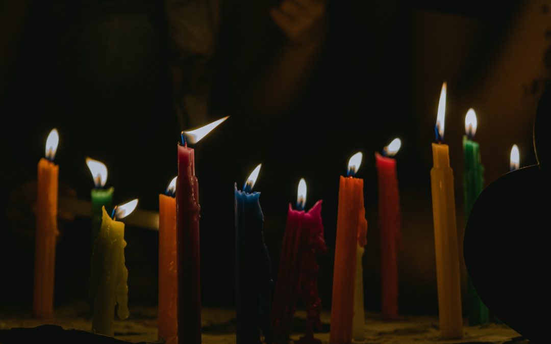 assorted-color lighted candles