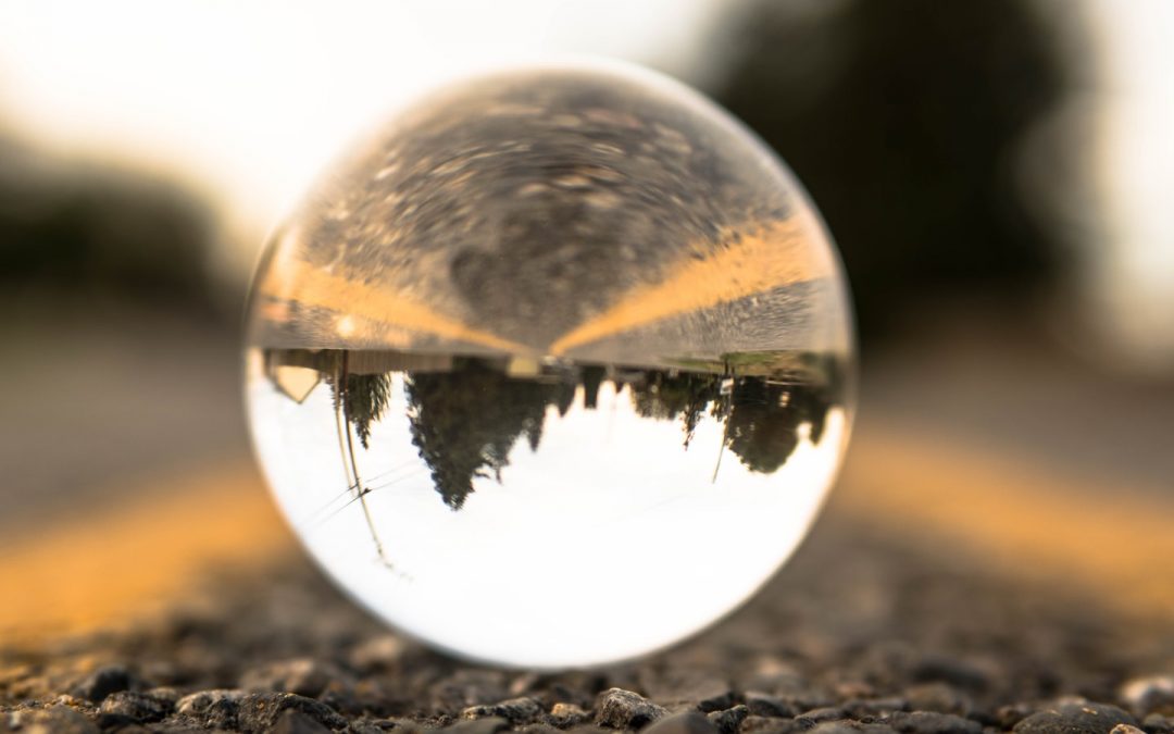clear glass ball on ground during daytime