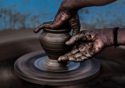 person molding vase
