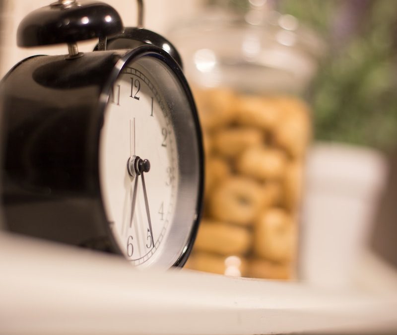 black and silver alarm clock