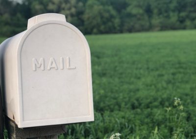 shallow focus photography of gray mailbox