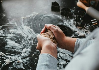 person molding clay