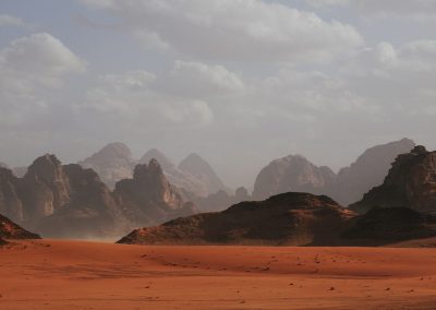mountains under white clouds at daytime