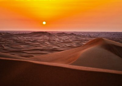 sand dunes during sunset