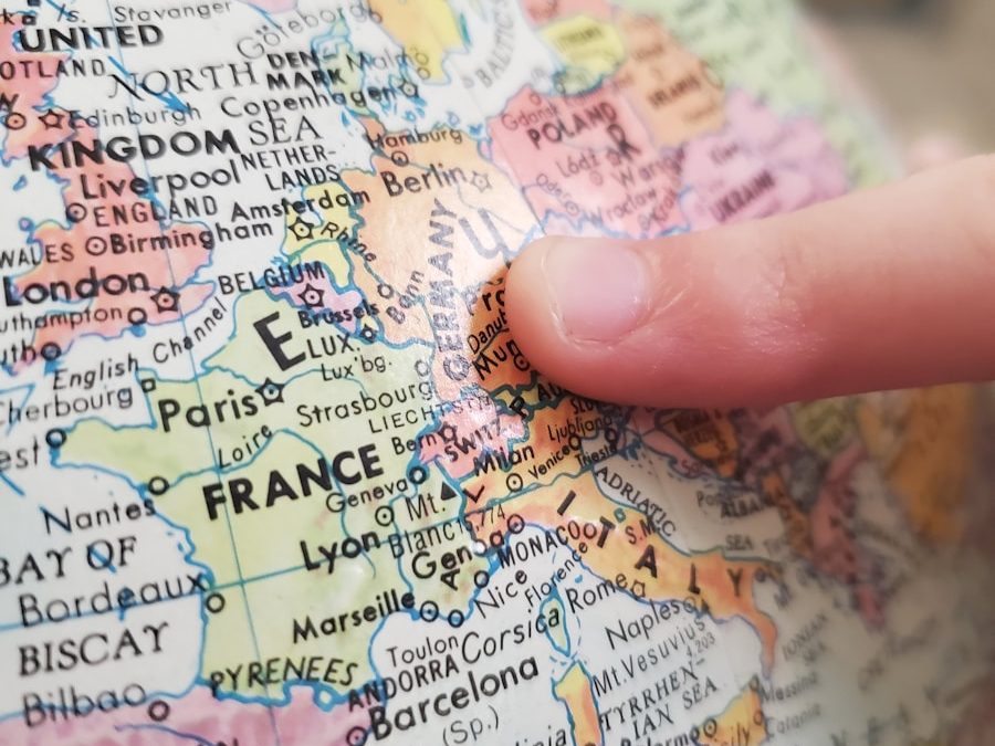 person holding white and blue map